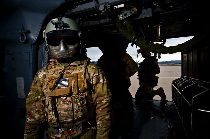 U.S. Air Force Staff Sgt. Luke Spain, 66th Rescue Squadron aerial gunner, waits to depart for training during the terminal employment phase March 18, 2013, at the Orchard Combat Training Center, Idaho. Service members from rescue squadrons across Air Combat Command participated to support the phase. The "T.E." mission objective is to demonstrate and instruct HH-60 Pave Hawk weapons employment and landing zone options to U.S. Air Force Weapons School students by maximizing weapons proficiency and quickly recover survivors. The phase is one out of a series of advanced training programs administered at the USAF Weapons School located at Nellis Air Force Base, Nev. (U.S. Air Force photo by Senior Airman Brett Clashman)
