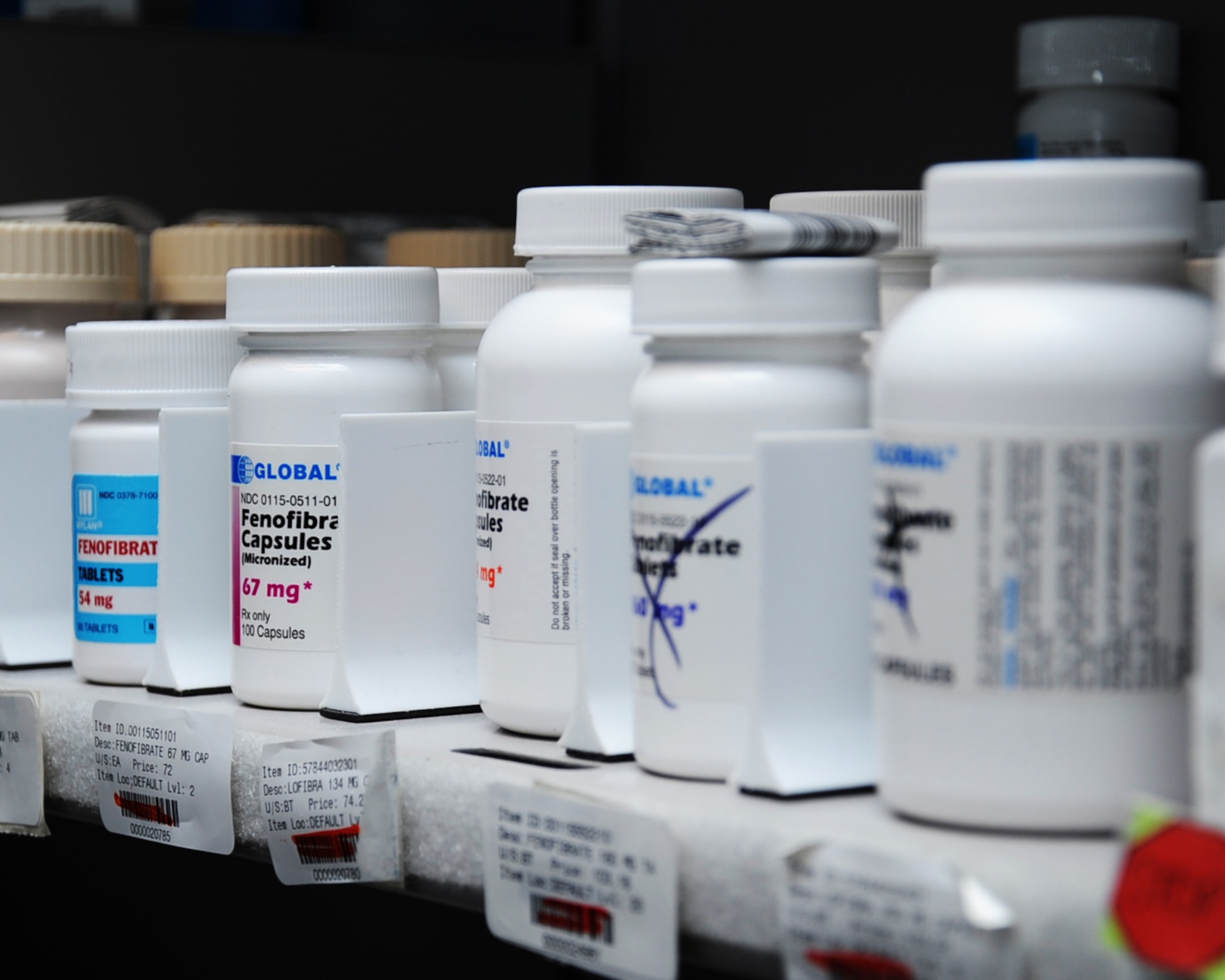 Medications are stored on a shelf at the main pharmacy on Barksdale Air Force Base, La. The main pharmacy handles all prescriptions issued by the clinic while the satellite pharmacy handles all off-base prescriptions. Both pharmacies carry a variety of medications used to treat patients. (U.S. Air Force photo/Senior Airman Sean Martin)