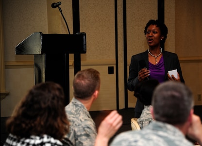 Dr. Chandra Curtis speaks to attendees at the Women's History luncheon  March 25, 2013, at the Charleston Club at Joint Base Charleston - Air Base, S.C. Curtis is responsible for cultivating researchers as a resource to address technical challenges for the U.S. Navy and Marine Corps at the Space and Naval Warfare Systems Command Atlantic in North Charleston, S.C. The luncheon, along with other events this month, was held to observe Women's History Month, an annual observance recognized around the world highlighting the contributions of women throughout history and in today’s society.