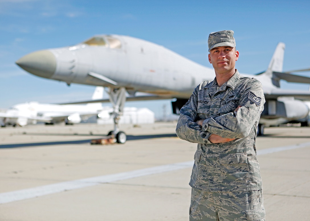 Tech. Sgt. Chad McBunch, 31st Test and Evaluation Squadron B-1 crew chief, stands in front of one of the first B-1s he worked on as a first-term Airman upon arriving at Edwards as a dedicated crew chief in 2002. (U.S. Air Force photo by Jet Fabara)
