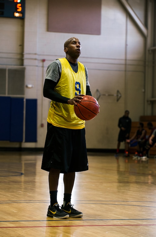 Andrew Harris prepares for a free throw during the Intramural Basketball Championship March 25, 2013, at Joint Base Charleston - Air Base, S.C. The 628th CES beat the 628th LRS 48 to 30 to become JB Charleston's basketball champions. (U.S. Air Force photo/ Senior Airman George Goslin)