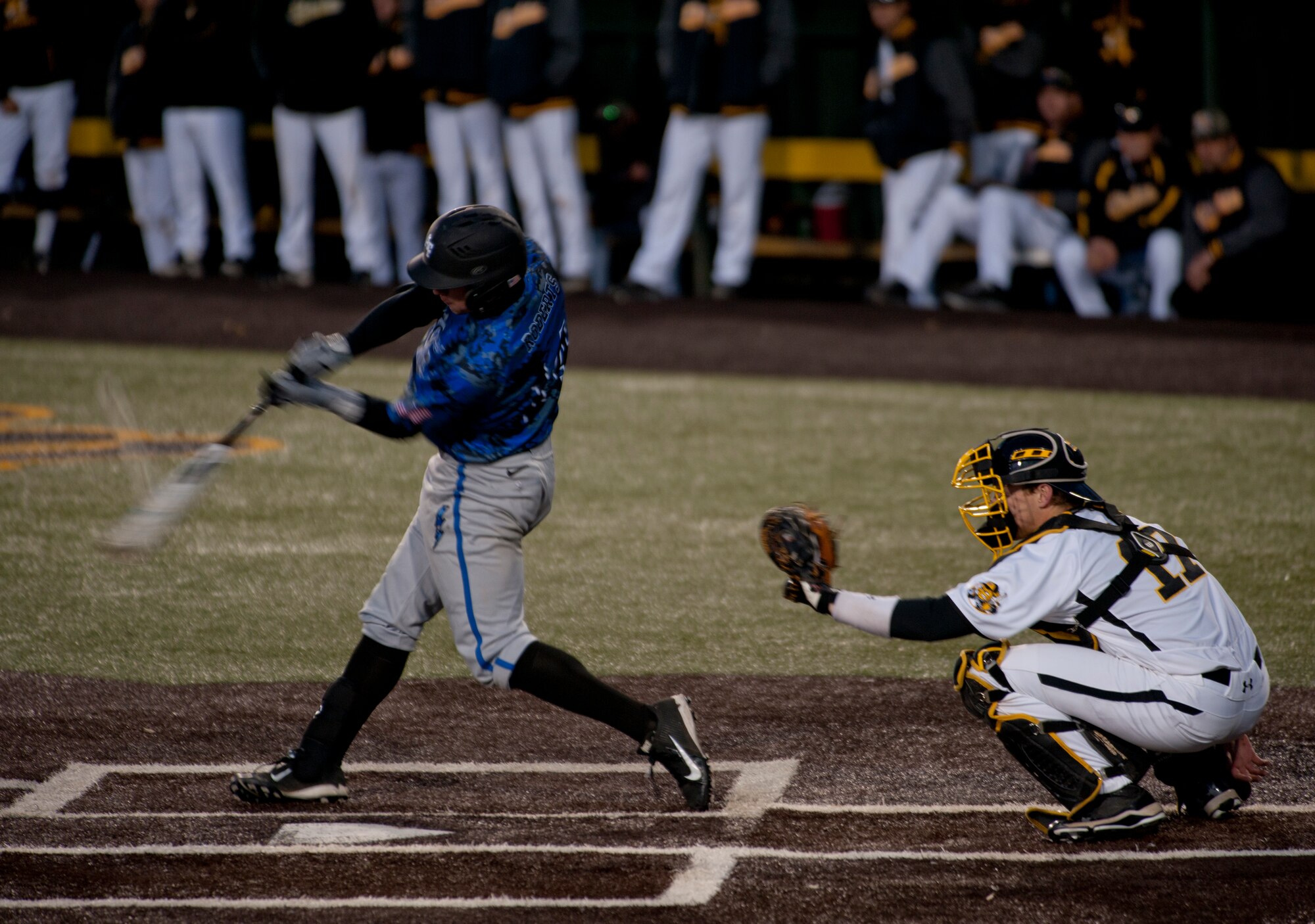 Cadet 1st Class Matthew Roberts hits a foul ball during in an attempt to score against the Wichita State University Shockers March 26, 2013, Wichita, Kan. While only hitting one run the entire game, the Academy threw a total of 14 strikeouts through their 8 innings of defense. (U.S. Air Force photo/Airman 1st Class John L. Linzmeier)