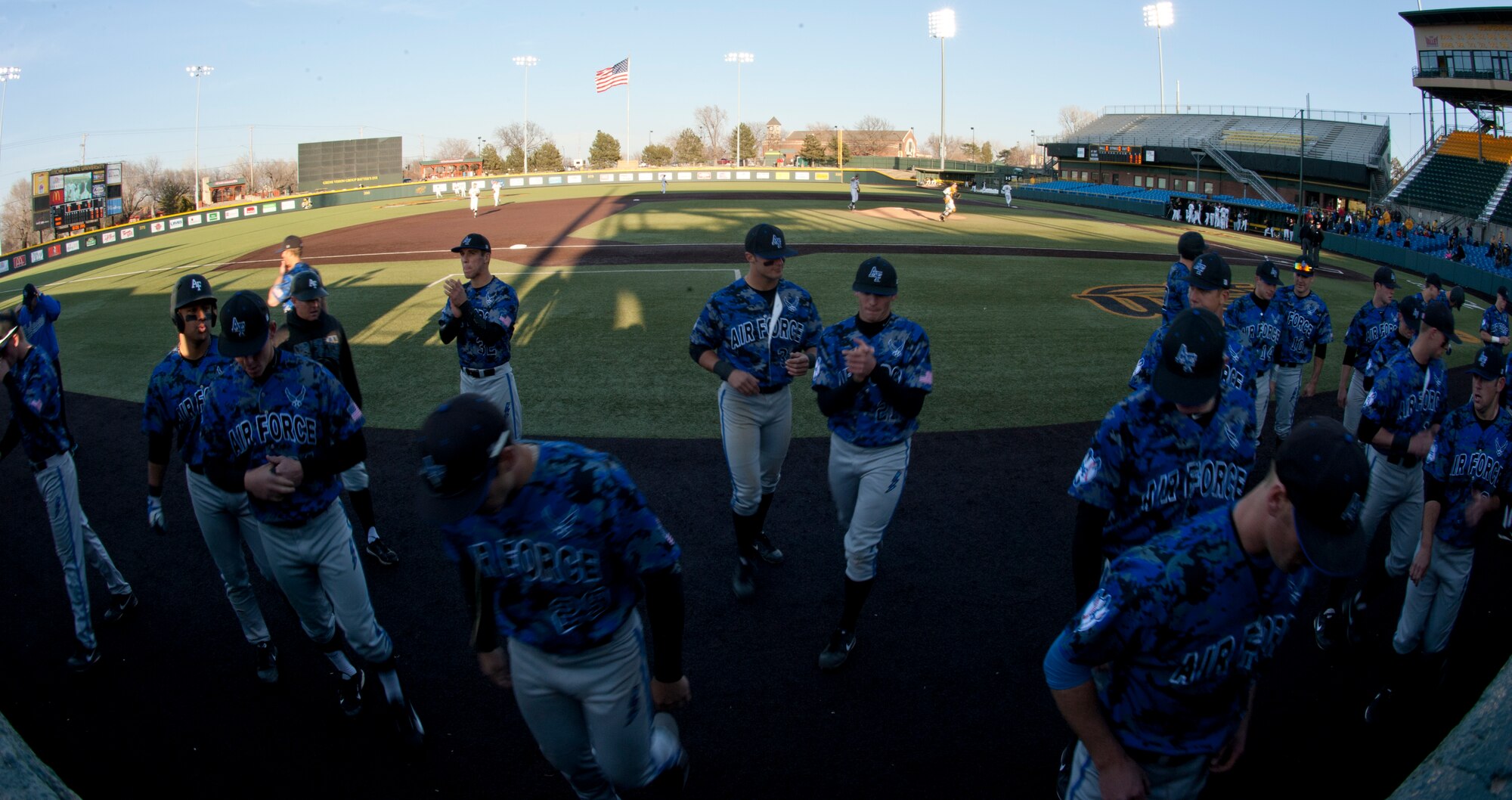 Members of the Air Force Academy men’s baseball team prepare to begin a game against the Wichita State University Shockers March 26, 2013, Wichita, Kan. The Academy lost 3-2 after an eighth-inning comeback by the Shockers in the first of a two-game series. (U.S. Air Force photo/Airman 1st Class Victor J. Caputo)