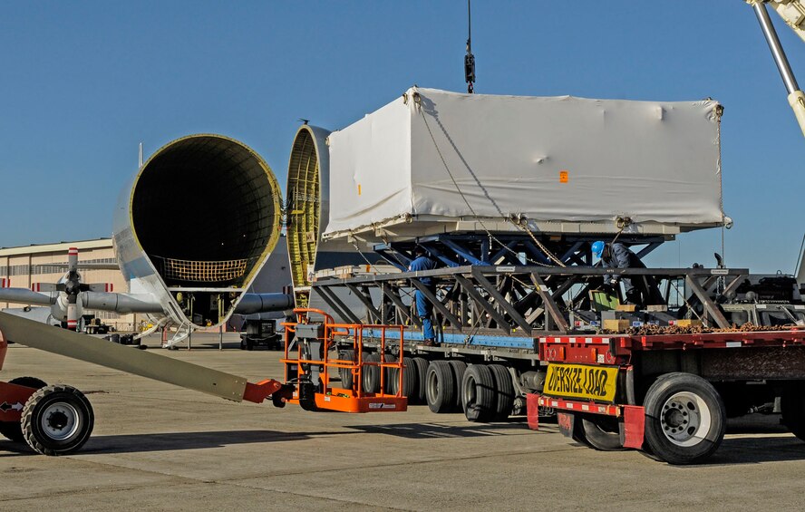 HANSCOM AIR FORCE BASE, Mass. – A heat shield for the Orion spacecraft is unloaded from NASA’s Super Guppy aircraft on the flightline March 27. The heat shield is being delivered to Textron Defense Systems in Wilmington, Mass., to have a protective coating applied to it. (U.S. Air Force photo by Walter Santos)