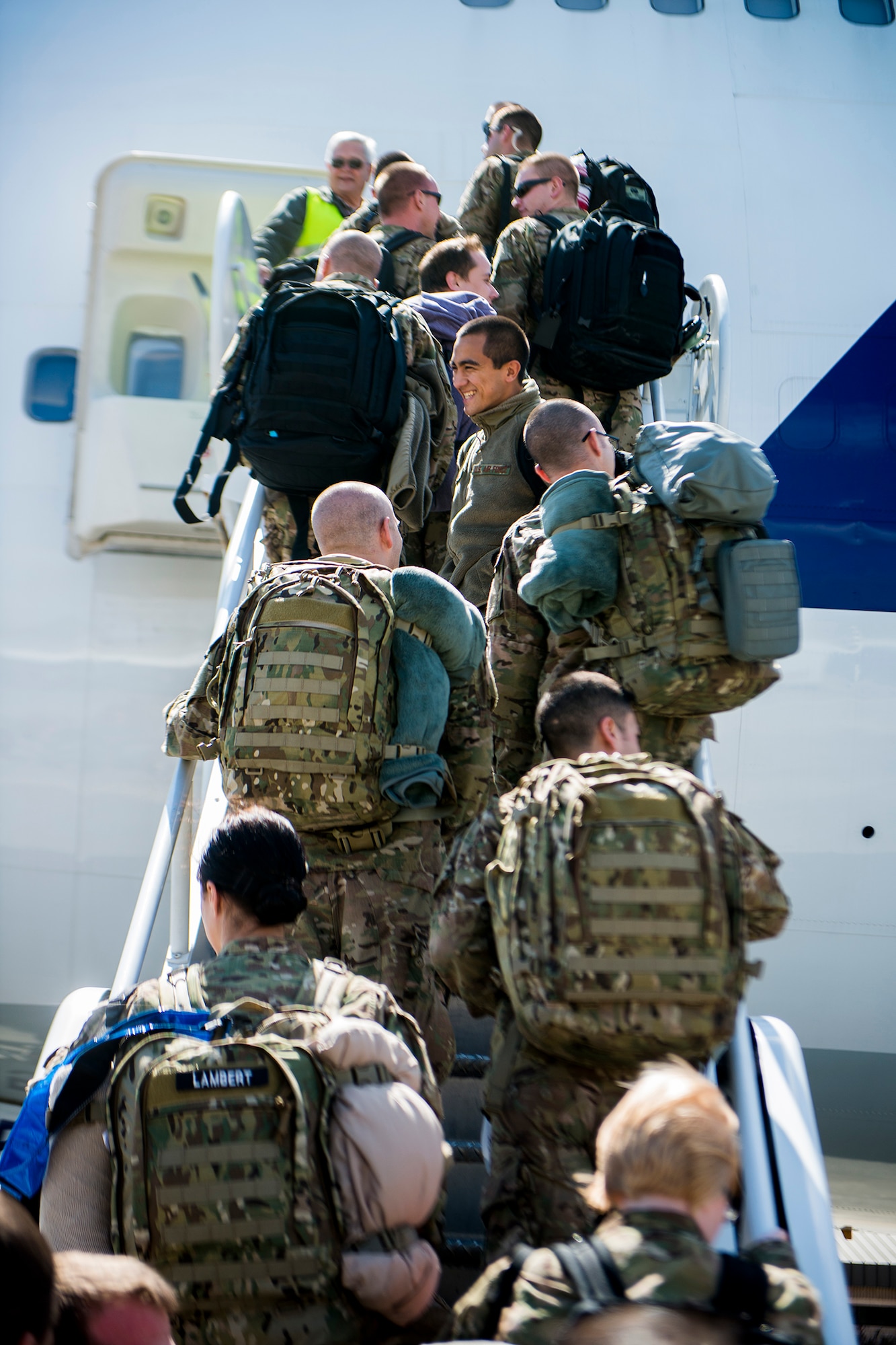Airmen board a Boeing 747 March 26, 2013, at Moody Air Force Base, Ga. Approximately 350 Airmen left Moody for a six-month deployment to Southwest Asia. (U.S. Air Force photo by Staff Sgt. Jamal D. Sutter/Released) 