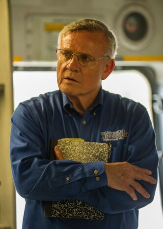 Dr. Ken Kirby, University of Tennessee - Knoxville professor, listens to a briefing on features of the C-17 Globemaster III during a visit March 18, 2013, at Joint Base Charleston, S.C. Kirby visited the base to train senior leaders on innovation and Air Force Smart Operations for the 21st Century    related topics. (U.S. Air Force photo/ Senior Airman George Goslin)