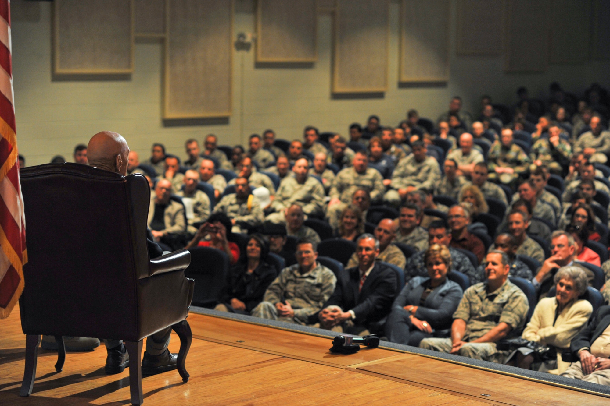 U.S. Army Air Force retired Lt. Col. Richard Cole, Doolittle Raider, answers a question asked by the crowd at the Goodfellow Air Force base theater March 26, 2013. Team Goodfellow and San Angelo community members filled the theater to max capacity to get the opportunity to hear and meet the story of this legend. (U.S. Air Force photo/ Airman 1st Class Michael Smith)