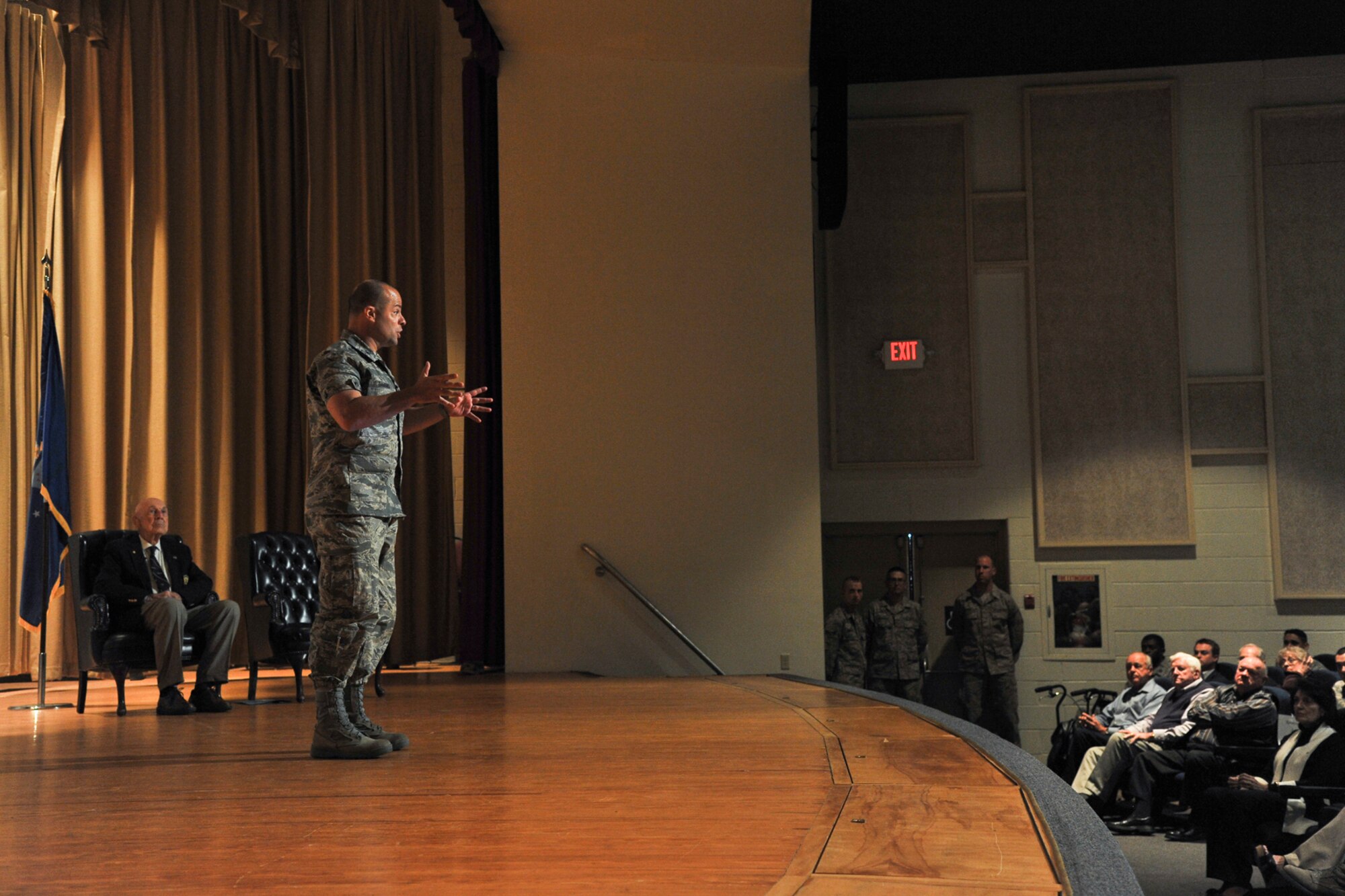 U.S. Air Force Col. Mark Damiano, 17th Training Wing commander, gives opening remarks to the crowd on the accomplishments of retired Lt. Col. Richard Cole, Doolittle Raider, at the Goodfellow Air Force base theater March 26, 2013. Team Goodfellow and San Angelo community members filled the theater to max capacity to get the opportunity to hear and meet the story of this legend. (U.S. Air Force photo/ Airman 1st Class Michael Smith)