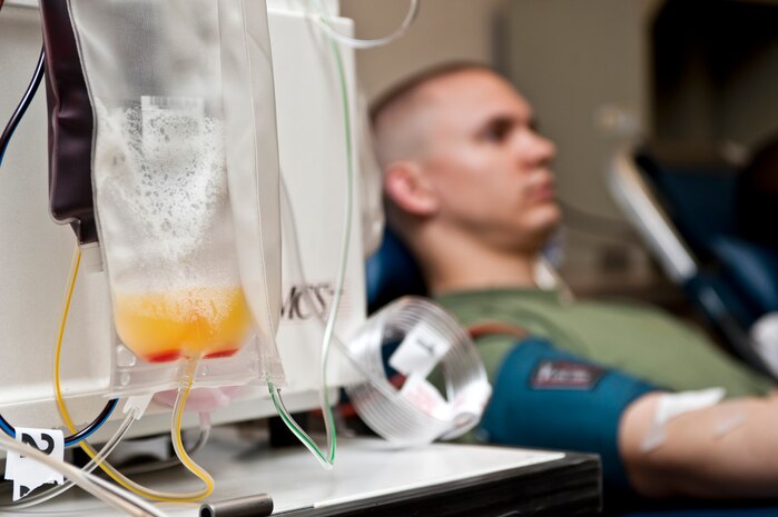 Staff Sgt. Stephen Thompson’s blood is separated into plasma during the 57th Wing blood drive March 25, 2013, at Nellis Air Force Base, Nev. Thompson is a weapons system controller with the 366th Maintenance Operations Squadron who is TDY here from Mountain Home AFB, Idaho. Plasma is used to maintain blood pressure and assists in clotting. (U.S. Air Force photo by Airman 1st Class Jason Couillard)