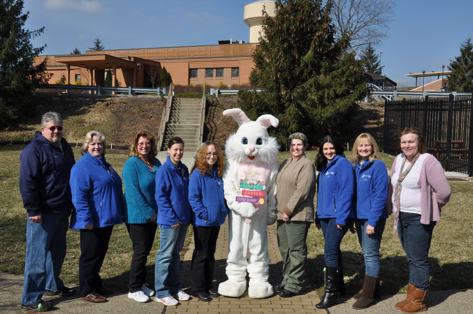 Members of the 911th Airlift Wing Key Spouse Group and Services Squadron gather together with the Easter Bunny after successfully completing the Wing’s annual Easter egg hunt, March 23, 2013. More than 50 families joined in on the festivities which included an Egg hunt, snacks, drinks and goodie bags for the children in attendance. (U.S. Air Force photo by Senior Airman Joseph E. Bridge)