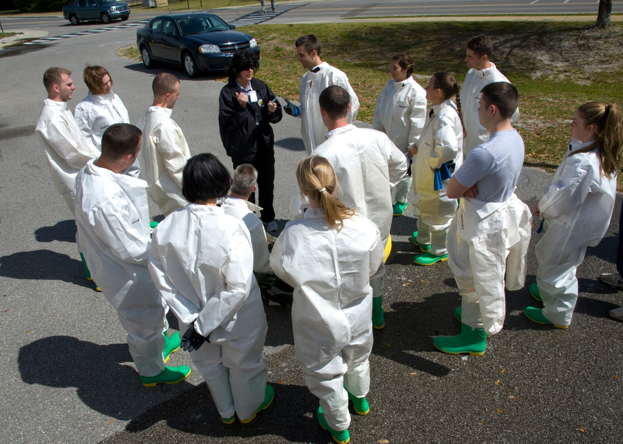 U.S. Air Force Airmen receive instruction on shelter preparation during the In-Place Patient Decontamination Exercise on Hurlburt Field, Fla. March 21, 2013. Temporary decontamination shelters are usually set up in hazardous situations to care for contaminated patients. (U.S. Air Force photo/ Airman 1st Class Nigel L Sandridge)