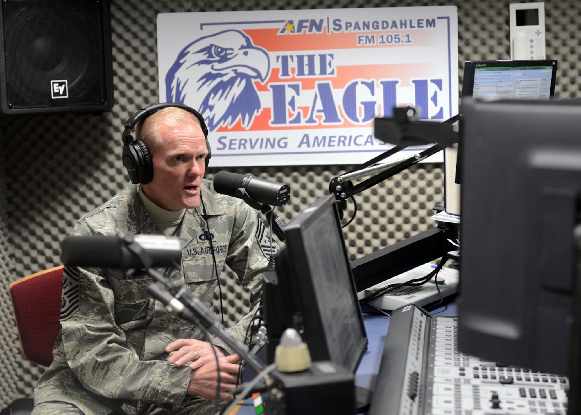 SPANGDAHLEM AIR BASE, Germany -- Chief Master Sgt. of the Air Force James Cody talks on his first live American Forces Network radio show interview March 26, 2013. Cody spoke for nearly 45 minutes to Spangdahlem listeners about key Air Force issues and priorities. (U.S. Air Force photo by Staff Sgt. Daryl Knee/Released)