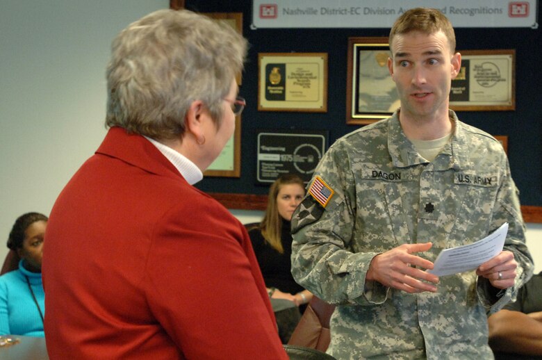 Lt. Col. Patrick Dagon, U.S. Army Corps of Engineers Nashville District deputy commander, introduces Vicki H. Metzgar, director of Middle Tennessee STEM Innovation Network, who spoke during a Women's History Month event at the district headquarters in Nashville, Tenn., March 26, 2013. (USACE photo by Lee Roberts)