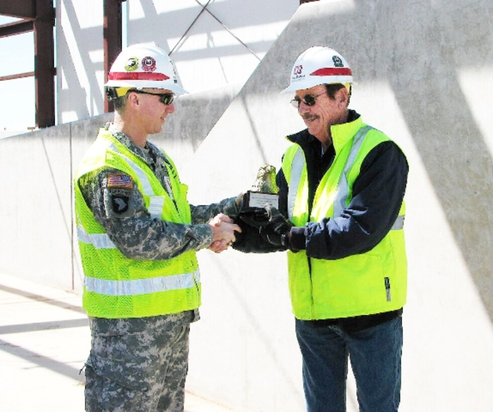 Tulsa District Commander Col. Michael Teague presents the 2012 Eagle Eye Construction Safety Program Award for Construction Representative of the Year to Donnie Lankford, Tulsa District, Pantex Resident Office.