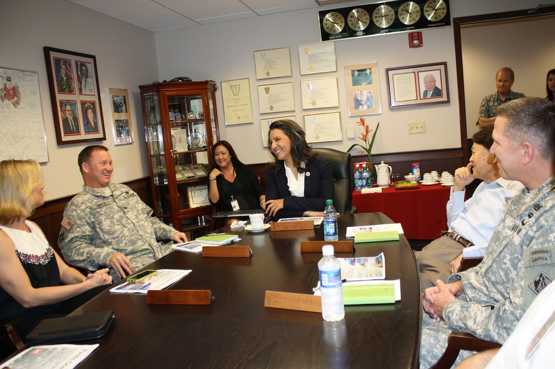 Leaders from the Pacific Ocean Division and Honolulu District hosted a visit by U.S. Representative Tulsi Gabbard and provided her an overview of how the U.S. Army Corps of Engineers is helping to build stability and security in the Pacific and making people’s lives better.  Seated left to right are Amy Asselbaye, chief of staff for U.S. Representative Tulsi Gabbard; Col. Gregory J. Gunter, commander of Pacific Ocean Division, U.S. Army Corps of Engineers; Kris Young of Pacific Ocean Division; U.S. Representative Tulsi Gabbard; Gene Ban, director of Programs for Pacific Ocean Division; Lt. Col. Thomas D. Asbery, commander of the U.S. Army Corps of Engineers’ Honolulu District
