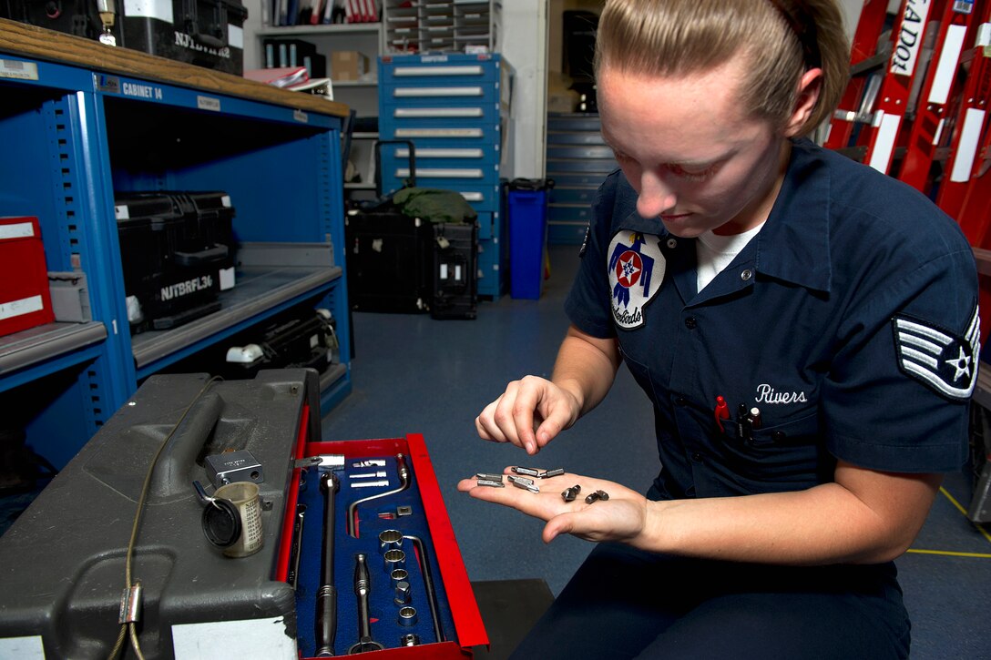 Air Force Staff Sgt. Jessica Rivers inventories a tool box on Nellis Air Force Base, Nev., March 15, 2013. Rivers, an aircraft structural maintenance technician, is one of 13 females assigned to the Air Force Thunderbirds air demonstration squadron for the 2013 show season.