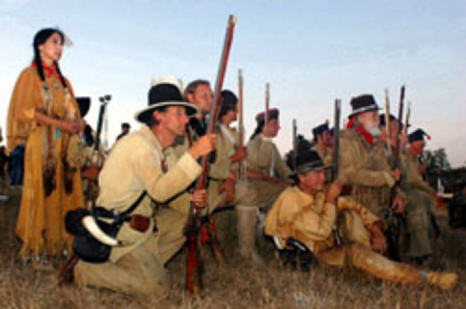 Re-enactors wait to welcome participants in the Lewis & Clark Youth Rendezvous sponsored by the National Guard at Fort Abraham Lincoln State Park in North Dakota in mid-August. About 300 high school students from all 50 states and four territories attended the weeklong celebration of the bicentennial of the Lewis and Clark Expedition.