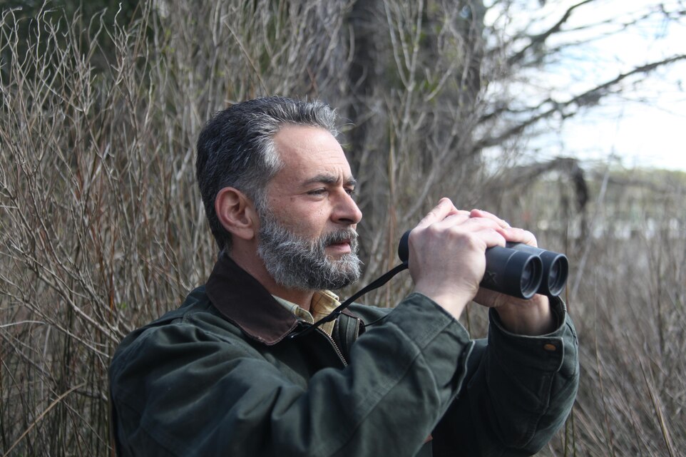 Carmen Lombardo, the natural resources manager at Cherry Point, observes an eagle’s nest located across from Hancock Marina March 26. Lombardo earned the 2013 North Carolina Land Trust Government Conservation Partner of the Year Award along with Carla Roth, a supervisory real estate contraction officer for the Navy. 