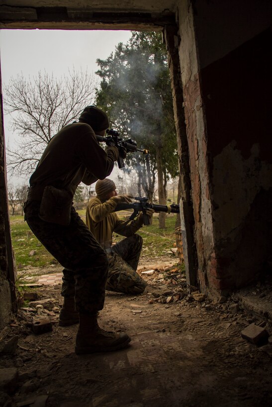 Combat Engineers assigned to Combat Logistics Battalion (CLB) 26, 26th Marine Expeditionary Unit (MEU), act as the opposition force during a counter improvised explosive device (IED) training exercise, Vaziani Airbase, Republic of Georgia, during exercise Agile Spirit 13, March 23, 2013. The 26th MEU is deploying to the 5th and 6th Fleets area of operations. The 26th MEU operates continuously across the globe, providing the president and unified combatant commanders with a forward-deployed, sea-based quick reaction force. The MEU is a Marine Air-Ground Task Force capable of conducting amphibious operations, crisis response and limited contingency operations. (U.S. Marine Corps motion media by Lance Cpl. Juanenrique Owings/Released)