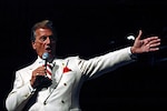 Legendary singer Pat Boone performed the new song "For My Country: Ballad of the National Guard" during the National Guard Association of the United States' 128th General Conference in Albuquerque, N.M., in mid-September. (Photo by Sgt. Jim Greenhill, National Guard Bureau)