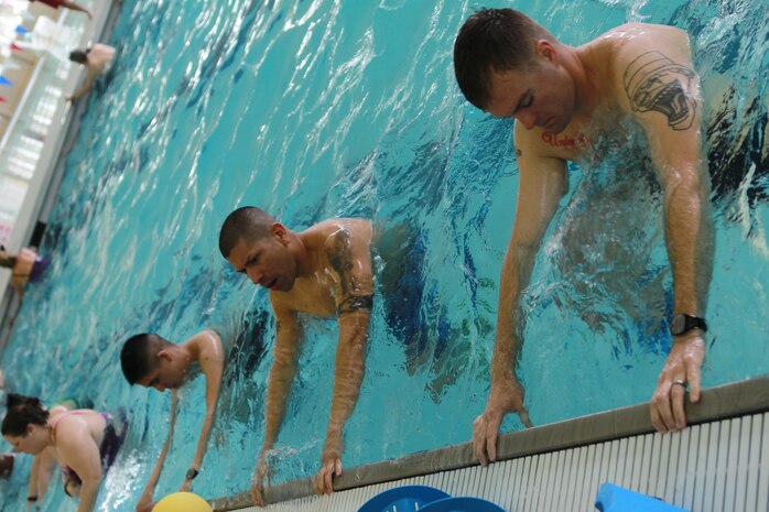 Marines, Marine Corps Community Services employees and Semper Fit instructors train in the Aquatic Maximum Power Intensity Training program aboard Marine Corps Air Station New River, Mar. 20. The AMP-IT program is designed to be a strenuous workout that even limited and light-duty Marines can do.
