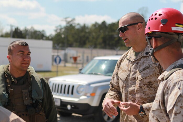 Marines with Special Operations Training Group gather a rope descending from an MV-22B Osprey flown by Marines with Medium Tiltrotor Training Squadron 263 during rappelling and fast-roping training, March 21. The Marines rappelled and fast-roped out of the Osprey 50 feet above ground during the training. 

