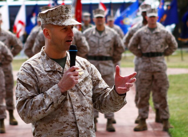 Col. Scott F. Benedict, the incoming commanding officer for the 24th Marine Expeditionary Unit, speaks to family and friends during a change of command ceremony aboard Camp Lejeune, N.C., March 21, 2013. Col. Benedict assumed command of the 24th MEU from Col. Frank Donovan and is responsible for leading the unit through its next training cycle and deployment scheduled for 2014. (Official USMC Photo by Cpl. Michael Petersheim/Released)