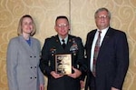 Sergeant First Class Garry Odom, readiness non-commissioned officer for the 213th Area Support Medical Company, received the 2006 Mary Ann Talley EMS Instructor/Coordinator of the Year award from Ms Joy Knobel, representing Mosby, the largest Emergency Medical Education book publisher in the country, and Mr Dave Garmon, Division Chairperson for NAEMT.