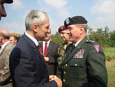 Serbian President Boris Tadi&#263; (left) and Maj. Gen. Gregory L. Wayt, Ohio adjutant general discuss State Partnership plans during Wayt's visit to Serbia September 24-30.