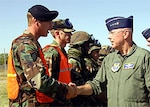 Gen. T. Michael Moseley, Chief of Staff of the Air Force, is greeted by Airmen during his visit here Oct. 12.