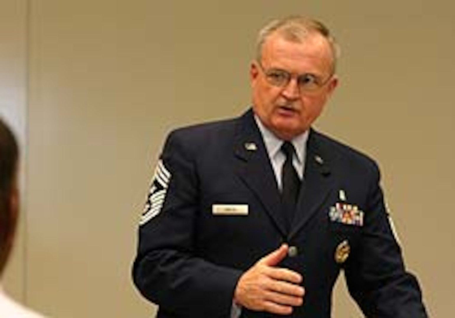 Chief Master Sgt. Richard Smith, the Air National Guard command chief master sergeant visits with the senior Air Guard enlisted leaders, first sergeants, select senior and junior NCOs and Airmen at the 5th Annual Enlisted Symposium on Oct. 21, in Bismarck, Ark.