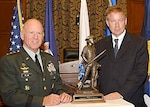 LTG H Steven Blum (left), chief of the National Guard Bureau, presented the 2006 Sonny Montgomery Award, the National Guard Bureau's highest award, to Congressman Thomas Davis III of Virginia at the Rayburn House Office Building in Washington Oct. 25.