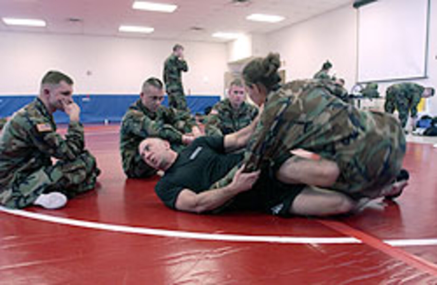 Level III combatives instructor, Sgt. 1st Class Jeffery Malloch, demonstrates a combatives move for students of the Pennsylvania Army National Guard at Fort Indiantown Gap, Pa.