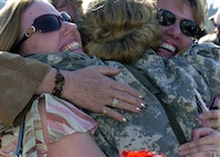 Soldiers from the Ohio National Guard's Headquarters and Headquarters Company, 16th Engineer Brigade, are overjoyed to see their friends and families Nov. 9 during a welcome home ceremony at the Vineyard Community Church in Westerville following a yearlong deployment to Iraq.