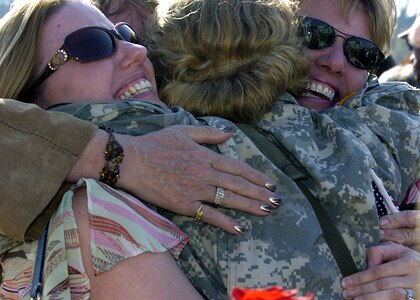 Soldiers from the Ohio National Guard's Headquarters and Headquarters Company, 16th Engineer Brigade, are overjoyed to see their friends and families Nov. 9 during a welcome home ceremony at the Vineyard Community Church in Westerville following a yearlong deployment to Iraq.