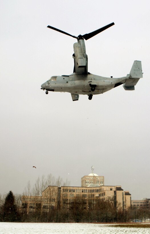 Demonstrating its versatile landing ability, an MV-22B Osprey from Marine Tiltrotor Squadron 266 (Reinforced), 26th Marine Expeditionary Unit, II Marine Expeditionary Force, Camp Lejeune, N.C., hovers above the track of Kelly Field before landing for a capabilities demonstration at Kelly Barracks, March 28. U.S. Marine Corps Forces Europe, U.S. Marine Corps Forces Africa, in coordination with U.S. European Command, U.S. Africa Command, the community of U.S. Army Garrison Stuttgart, Germany, received  “hands-on” experience with the MV-22B Osprey during a capabilities exercise on Patch Barracks, Kelley Barracks, and Stuttgart Army Airfield, that helped to familiarize the combatant commands with the possibilities and new abilities the aircraft could provide throughout their respective area of reach. The three MV-22 Osprey crews flew 1400 nautical miles from the Atlantic Ocean, without having to land to refuel, before arriving two days earlier. The MV-22 Osprey possess twice the speed, can fly twice as high, carry three times the payload, and travels five times the distance of other legacy, medium-lift helicopters. 
