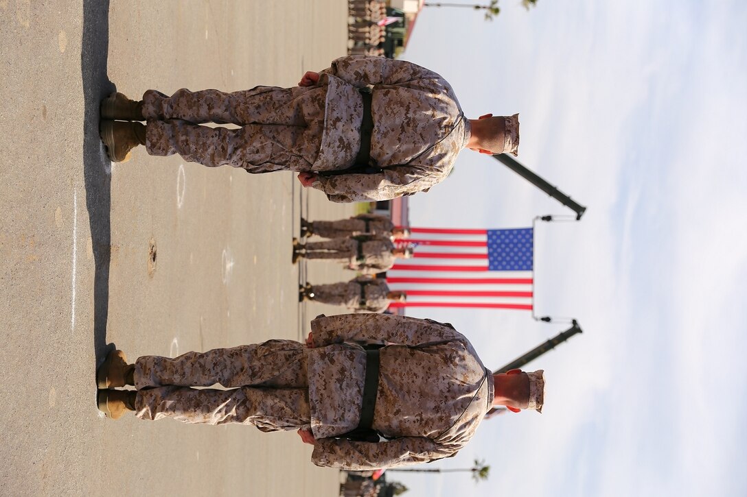 Col Matthew G. Trollinger, commanding officer,  11TH Marine Expeditionary Unit (MEU), and Maj Michael N. Estes prepare to change command during a change of command ceremony on Camp Pendleton, Calif., March 28, 2013. (U.S. Marine Corps photo by Cpl. Jonathan R. Waldman/Released)