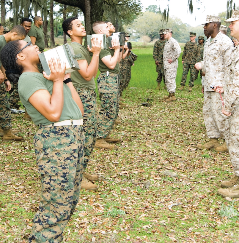 Using their trips here as a training opportunity, Junior Reserve Officers Training Corps cadets from Heritage, Newton County and Stockbridge high schools in Georgia toured Marine Corps Logistics Base Albany, March 19 and 21. Marines and Civilian-Marines received the Marine and Navy JROTC cadets with military working dog and Marine Corps Martial Arts Program demonstrations and a Marine Depot Maintenance Center tour. The students learned what being a Marine is all about by training Marine Corps-style on an obstacle course and combat fitness test. 