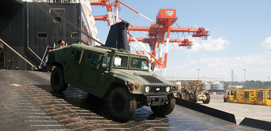Marines with 3rd Marine Expeditionary Brigade off-load a high-mobility multipurpose wheeled vehicle pier-side from the USNS 1st Lt. Jack Lummus March 21 in Subic Bay, Republic of the Philippines, during a Maritime Prepositioning Force off-load as part of Exercise Freedom Banner 2013.