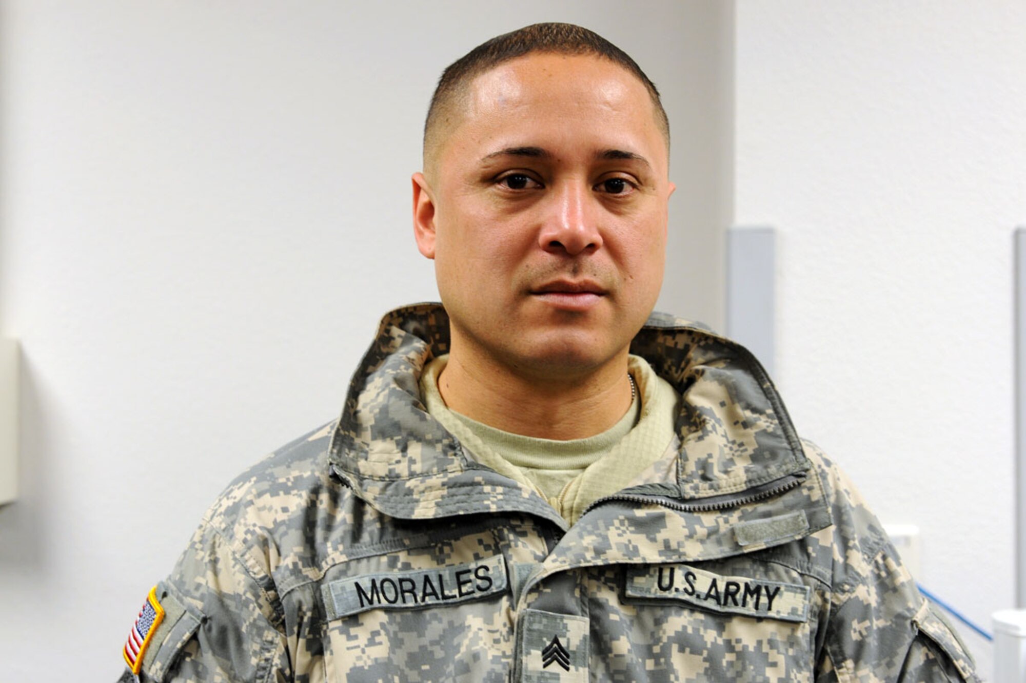Sgt. Carlos Morales, a paratrooper with the 725th Brigade Support Battalion, from Los Angeles, helped render first aid to Jason Mahi, 33, an assistant manager at an Anchorage Walmart store,  after suffering a gunshot wound March 16. (U.S. Army photo/Staff Sgt. Jeffrey Smith)