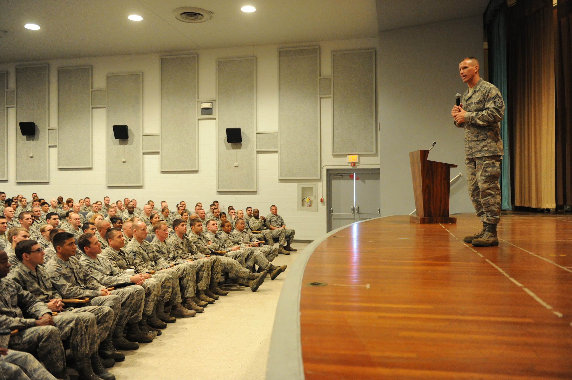 Chief Master Sgt. Steve McDonald, Pacific Air Forces command chief, speaks to enlisted service members at an enlisted call in the Memorial Theater on Joint Base Pearl Harbor-Hickam, Hawaii, March 27, 2013. McDonald spoke to the group about the importance of being resilient Airmen and thanked them for their hard work and dedication.  (U.S. Air Force photo/Tech. Sgt. Jerome S. Tayborn)