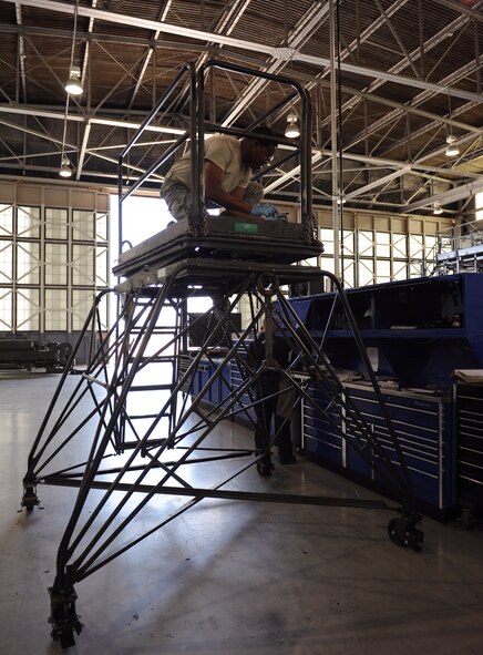Airman 1st Class Antonio Simon, 2nd Maintenance Squadron Aerospace Ground Equipment flight, lubricates a piece of metal on Barksdale Air Force Base, La., March 28. In order to prevent friction, lubrication oil is placed on all moving parts. (U.S. Air Force photo/Airman 1st Class Benjamin Gonsier)