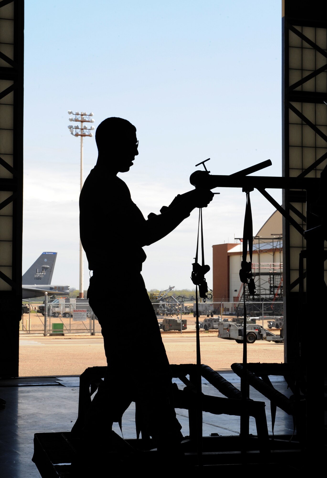 Airman 1st Class Nick Jaeger, 2nd Maintenance Squadron Aerospace Ground Equipment flight, conducts maintenance on a piece of equipment on Barksdale Air Force Base, La., March 28. AGE Airmen are responsible for the equipment that helps keep the B-52H Stratofortress operational. (U.S. Air Force photo/Airman 1st Class Benjamin Gonsier)