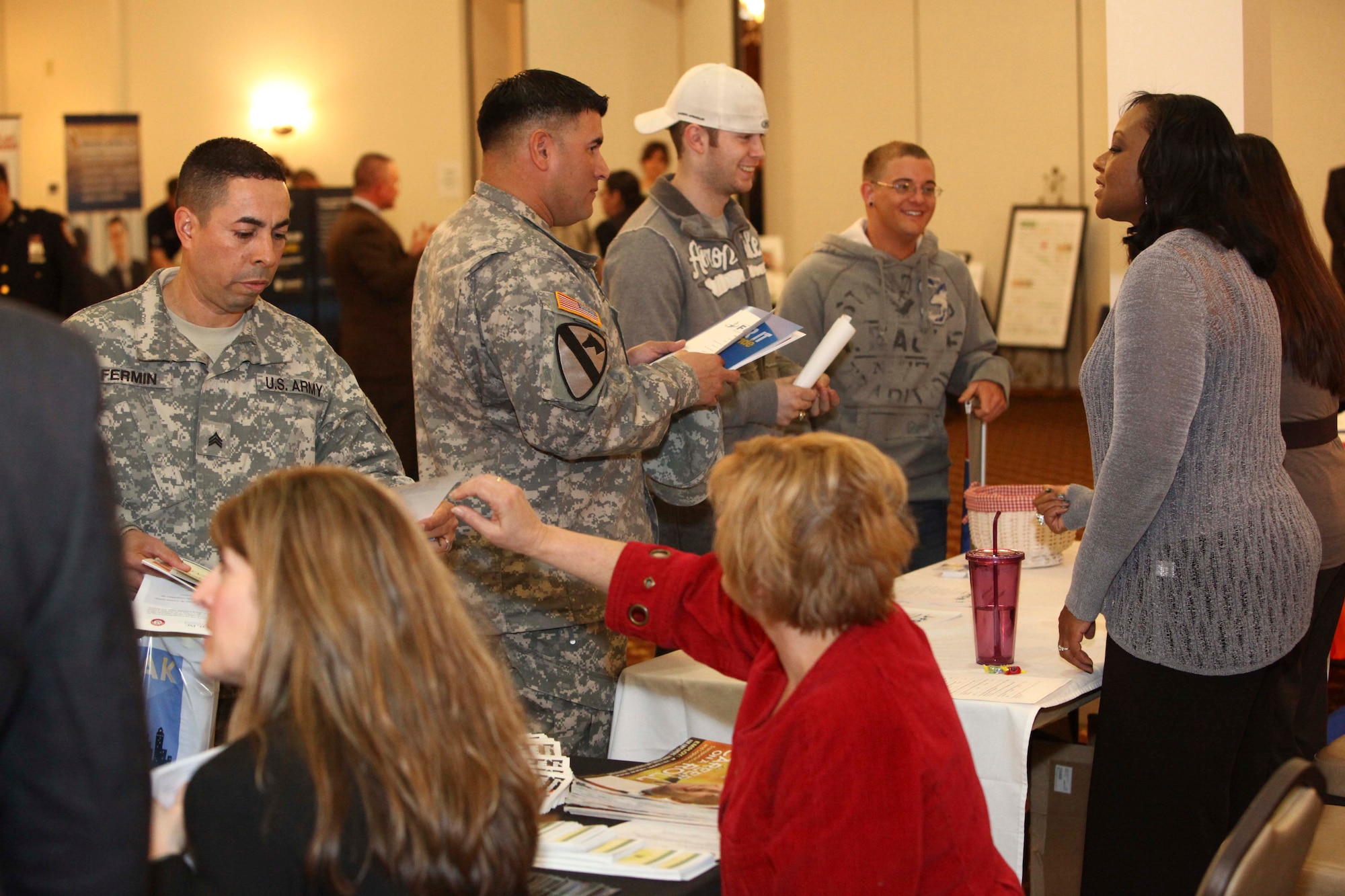 Joint base community members attend the Joint Base McGuire-Dix-Lakehurst Job Fair hosted by the Military and Family Support Center March 21, 2013, at Tommy B's Community Activities Center on JB MDL, N.J. The Job Fair, which brought potential employers to the base, was open to all Department of Defense ID cardholders and veterans.  (U.S. Air Force photo by Wayne Russell/Released)