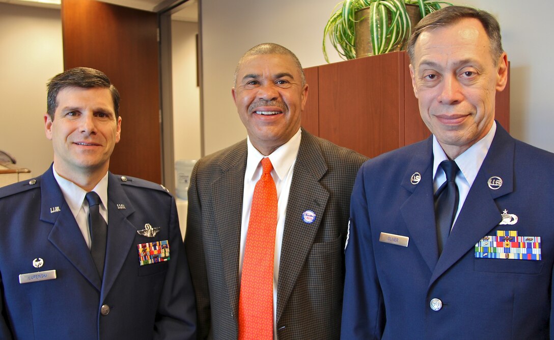 Col. Al Lupenski, 932nd Airlift Wing Commander,  meets with U.S. Rep. Lacy Clay of Missouri at his St. Louis office as part of the Air Force Reserve Command outreach program.  At right is Tech. Sgt. Daniel Oliver, a resident in Clay's district. AFRC wing commanders annually visit U.S. elected leaders who have military bases located in or near their districts. (U.S. Air Force photo/Maj. Stan Paregien)   