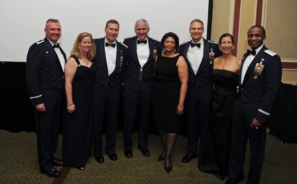 Current and former members of the 14th Airlift Squadron, including Lt. Gen. Darren W. McDew (right), 18th Air Force commander, attend the Order of the Pelican, an award ceremony recognizing extraordinary contributions to the unit, at the Francis Marion Hotel, Charleston, S.C., March 23, 2013. (U.S. Air Force photo by Staff Sgt. Michael C. Zimmerman)