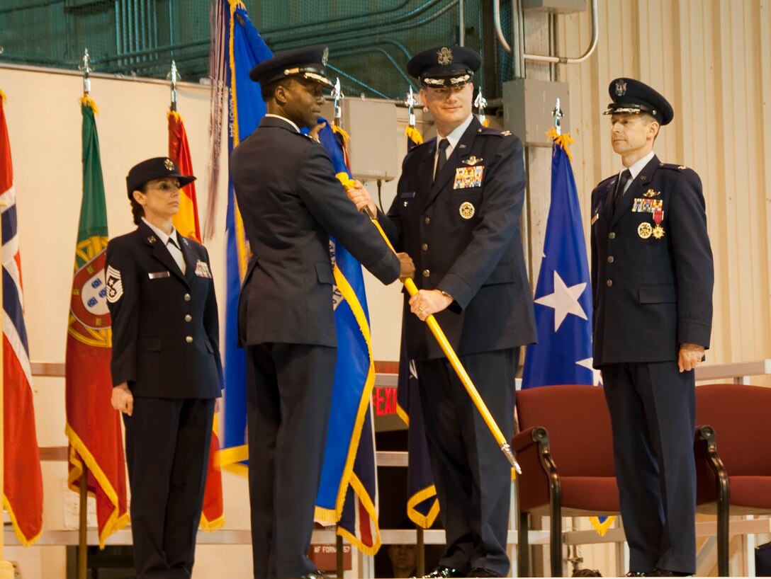 Col. Lance Bunch (right), accepts the 80th Flying Training Wing guidon from Gen. Edward A. Rice, commander of Air Education and Training Command, during the wing's change of command ceremony at Sheppard Air Force Base, Texas, on March 28, 2013.  The 80th FTW is home to the Euro-NATO Joint Jet Pilot Training program. (U.S. Air Force photo/Felton Joshua)