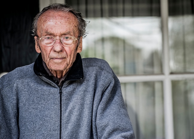 (Ret.) Colonel Will Gideon, former 437th Airlift Wing Supply Squadron commander and Resource Management deputy commander, enjoys his retirement from his front porch, March 26, 2013, in Mt. Pleasant, S.C. Gideon was interned as a Prisoner of War in North Vietnam after his F-105 Thunderchief fighter jet was shot down on August 7, 1966, and was held until his release on March 4, 1973. March 2013 marks the 40th anniversary of the American POWs coming home from the Vietnam War. (U.S. Air Force photo / Airman 1st Class Tom Brading)