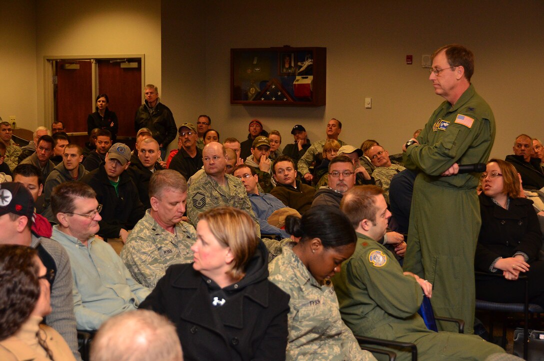 WRIGHT-PATTERSON AIR FORCE BASE, Ohio - Col. Stephen Goeman, 445th Airlift Wing commander, speaks to more than 200 445th AW air reserve technicians and civilians March 26 about the anticipation of possible furloughs and the potential actions if sequestration goes into effect next month. (U.S. Air Force photo/Staff Sgt. Mikhail Berlin)