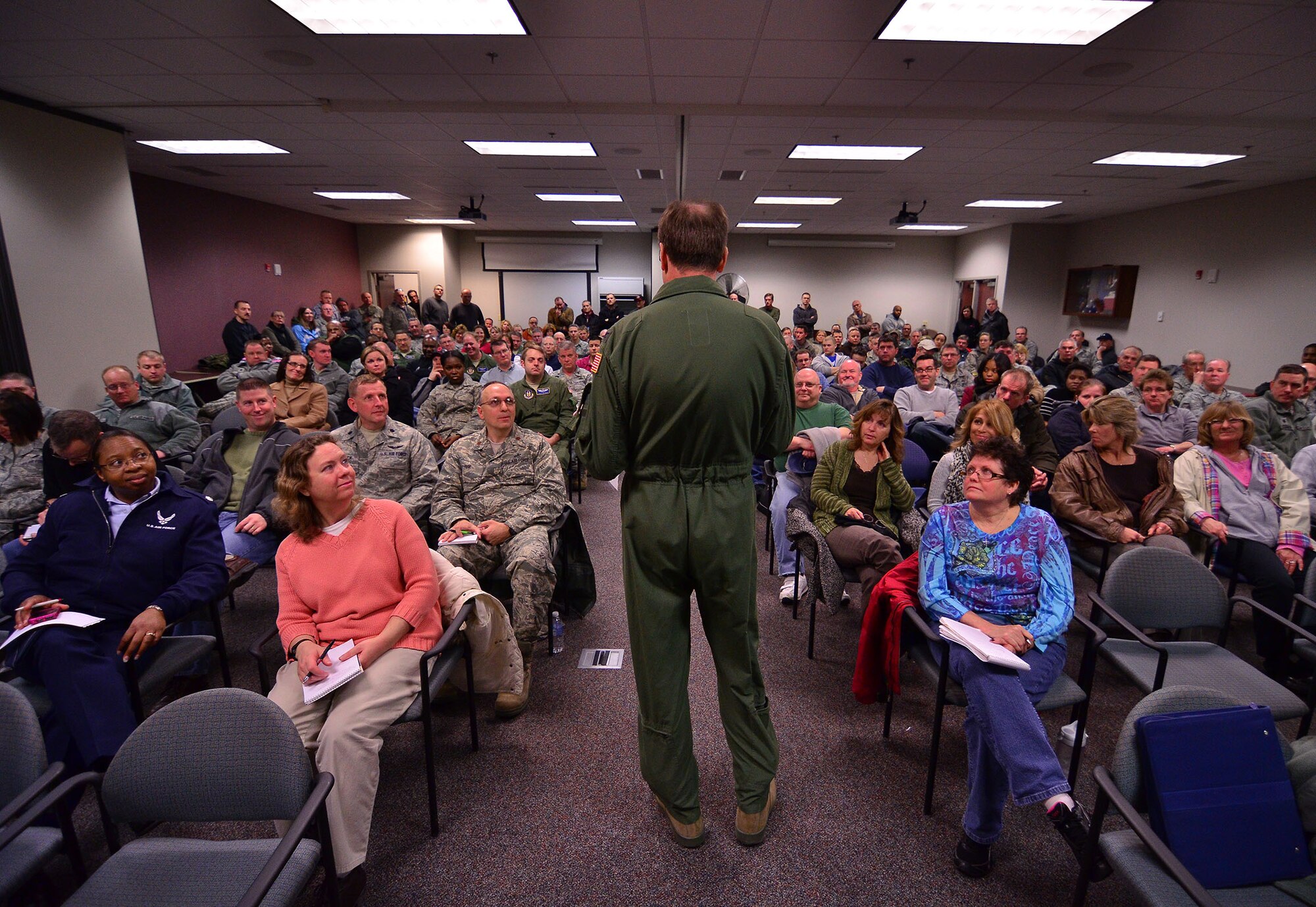 WRIGHT-PATTERSON AIR FORCE BASE, Ohio - Col. Stephen Goeman, 445th Airlift Wing commander, speaks to more than 200 445th AW air reserve technicians and civilians March 26 about the anticipation of possible furloughs and the potential actions if sequestration goes into effect next month. (U.S. Air Force photo/Staff Sgt. Mikhail Berlin)